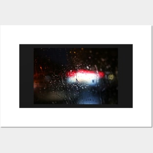 Deatil of raindrops on a car windshield at night Posters and Art